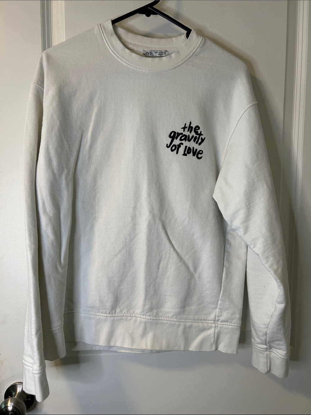 57. Zara White Crewneck with Black Chest Text Graphic